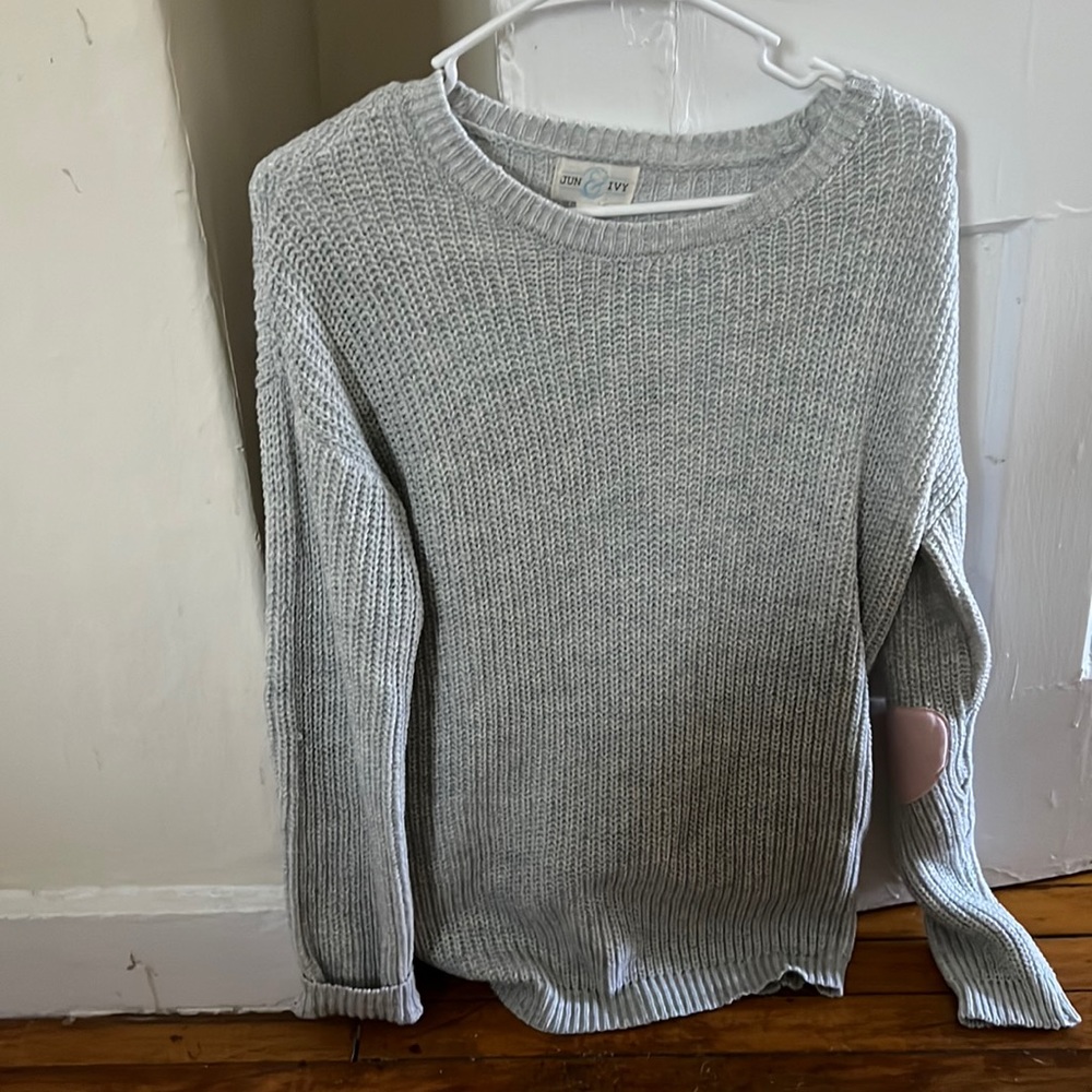 Long gray knit sweater with pink heart patches on the elbows